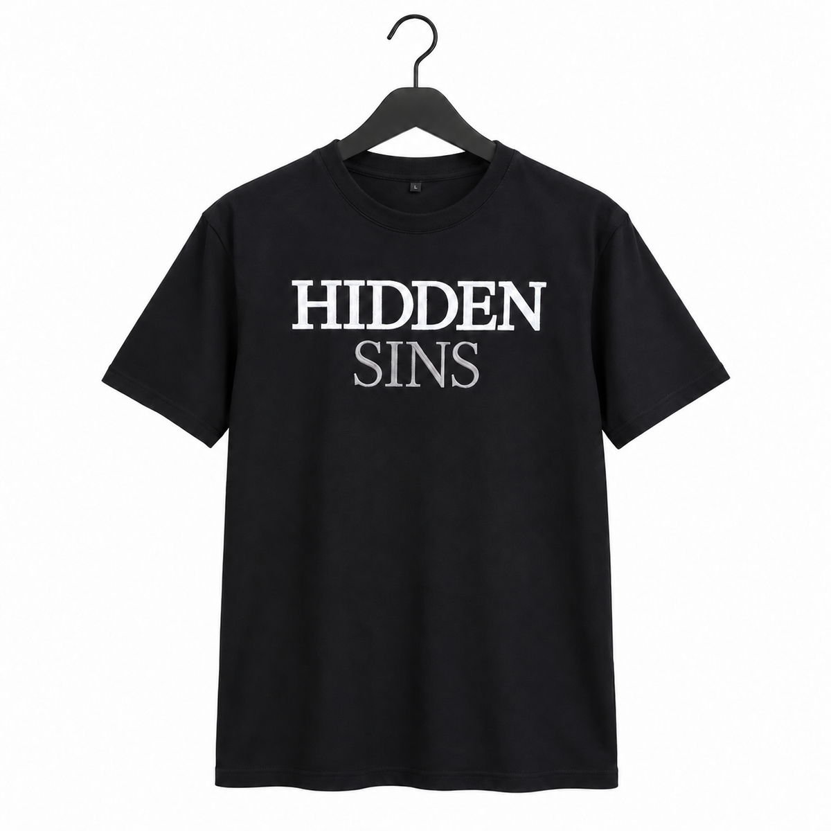 Edition 1 Tee — front on black hanger